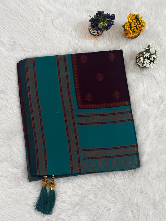 Plum & Teal Dual-Tone Silk Saree with Traditional Woven Border and Tassels