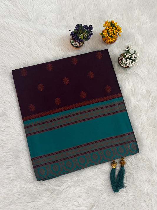 Plum & Teal Dual-Tone Silk Saree with Traditional Woven Border and Tassels