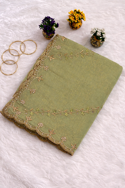 Pista Green Tissue Silk Saree with Bottle Green Embroidered Blouse